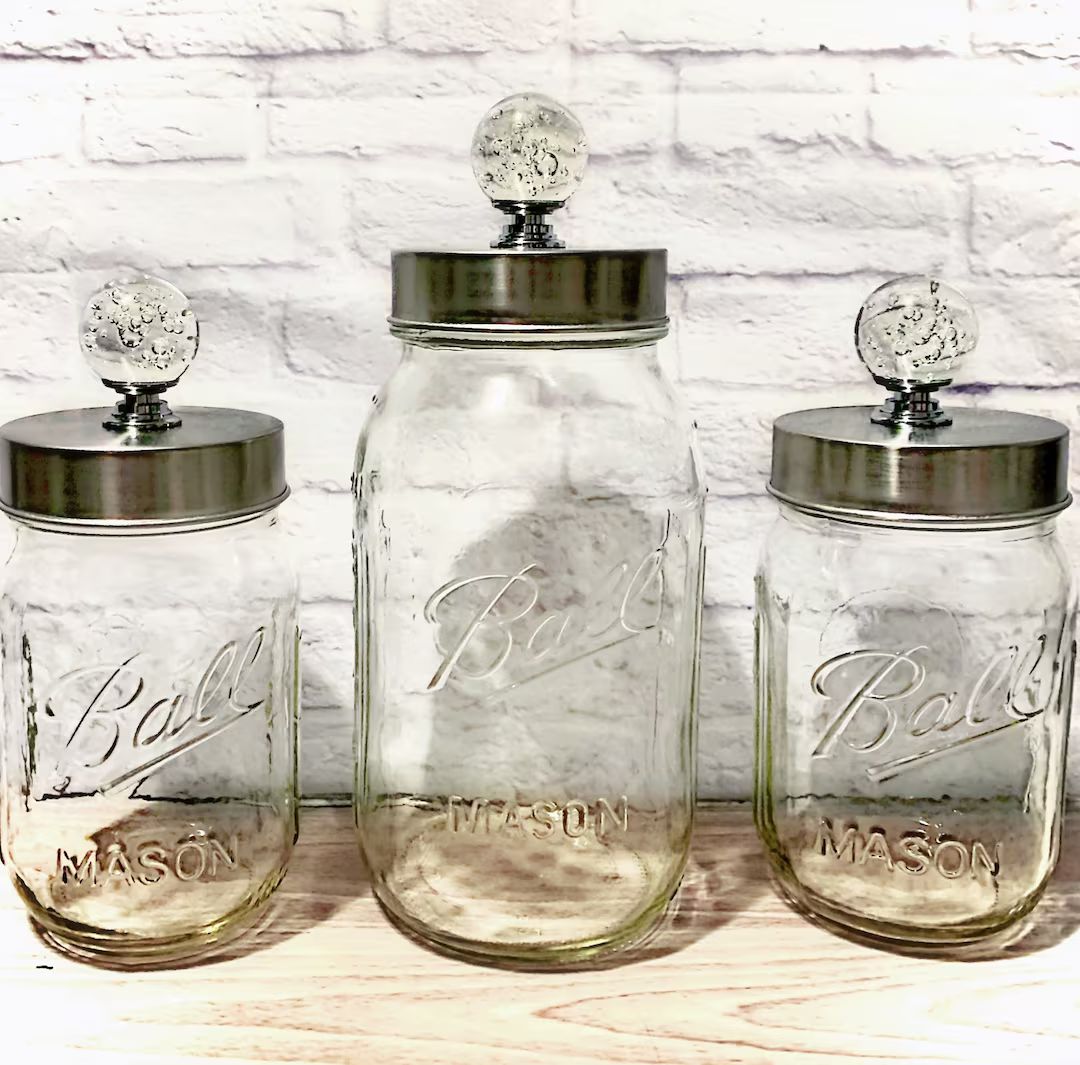 Clear Ball Mason Jar Canister Set w/ Stainless Steel Apothecary Lids and Round Crystal Glass Knob... | Etsy (US)