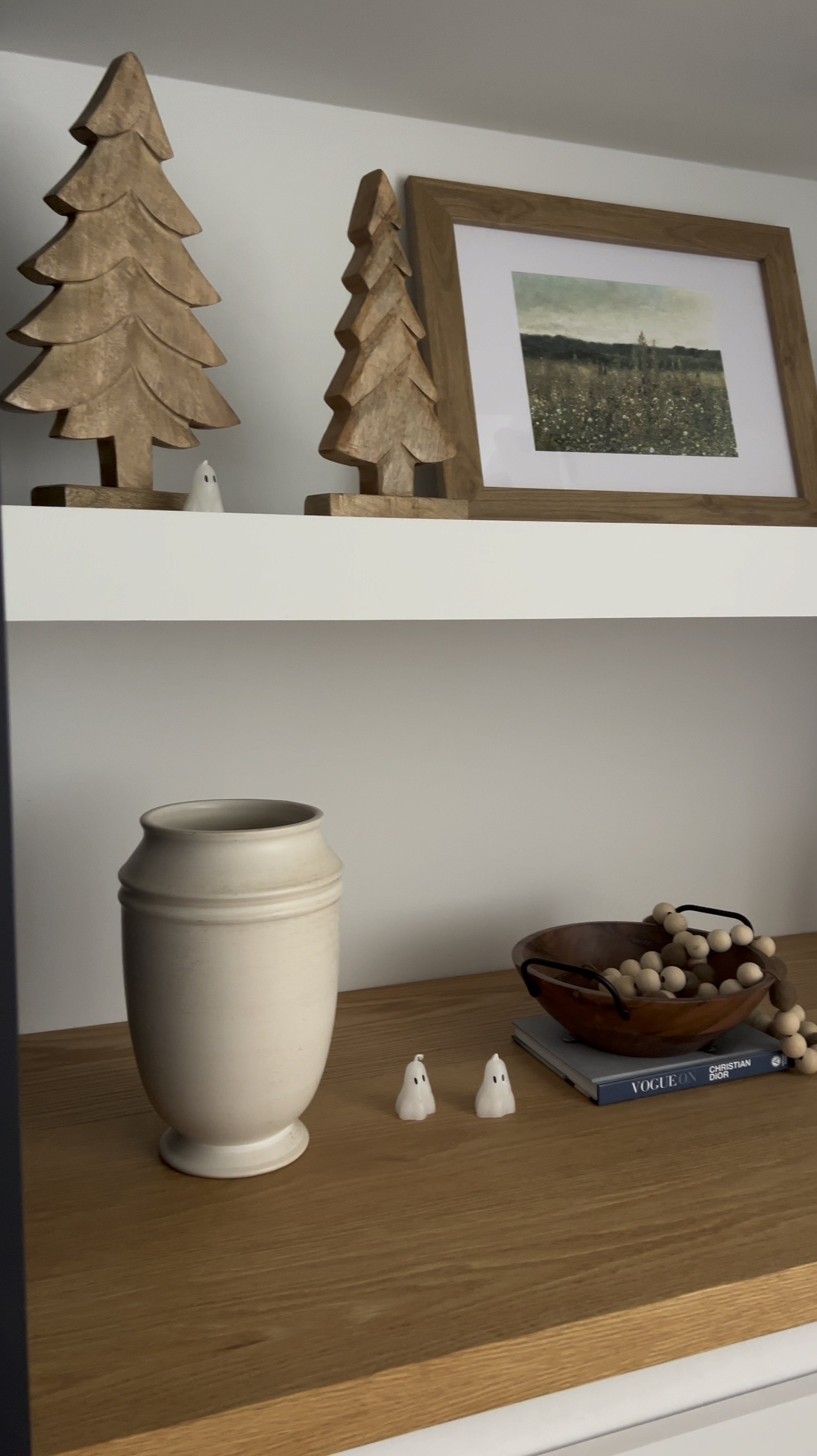 Spooky, but cute. 👻 

Simple halloween decor l home decor l ghost candles l wall of bats l shelving decor l seasonal 

#LTKSeasonal #LTKHalloween #LTKHome