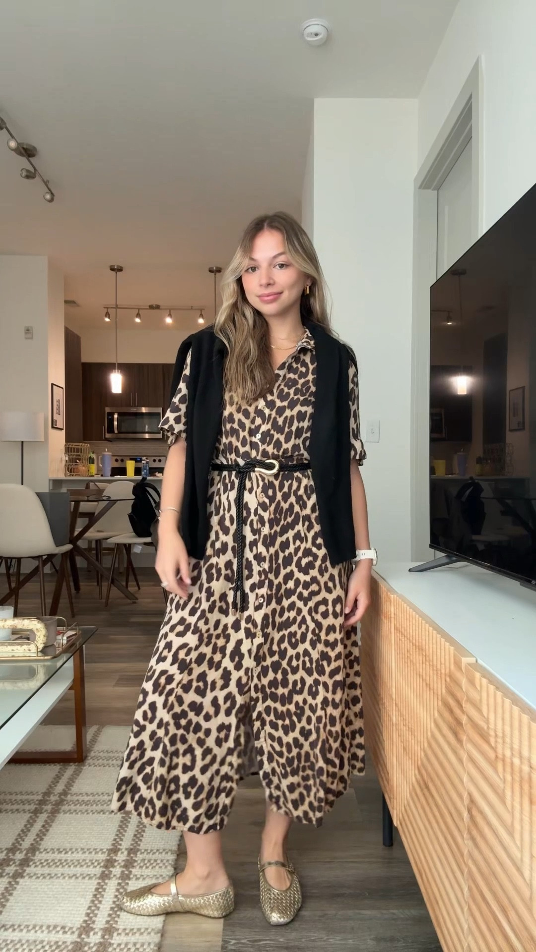 Fall transition outfit idea 🍂 A leopard print midi dress styled with a belt and knit layer for effortless chic. Perfect fall work outfit that easily goes from office to weekend.