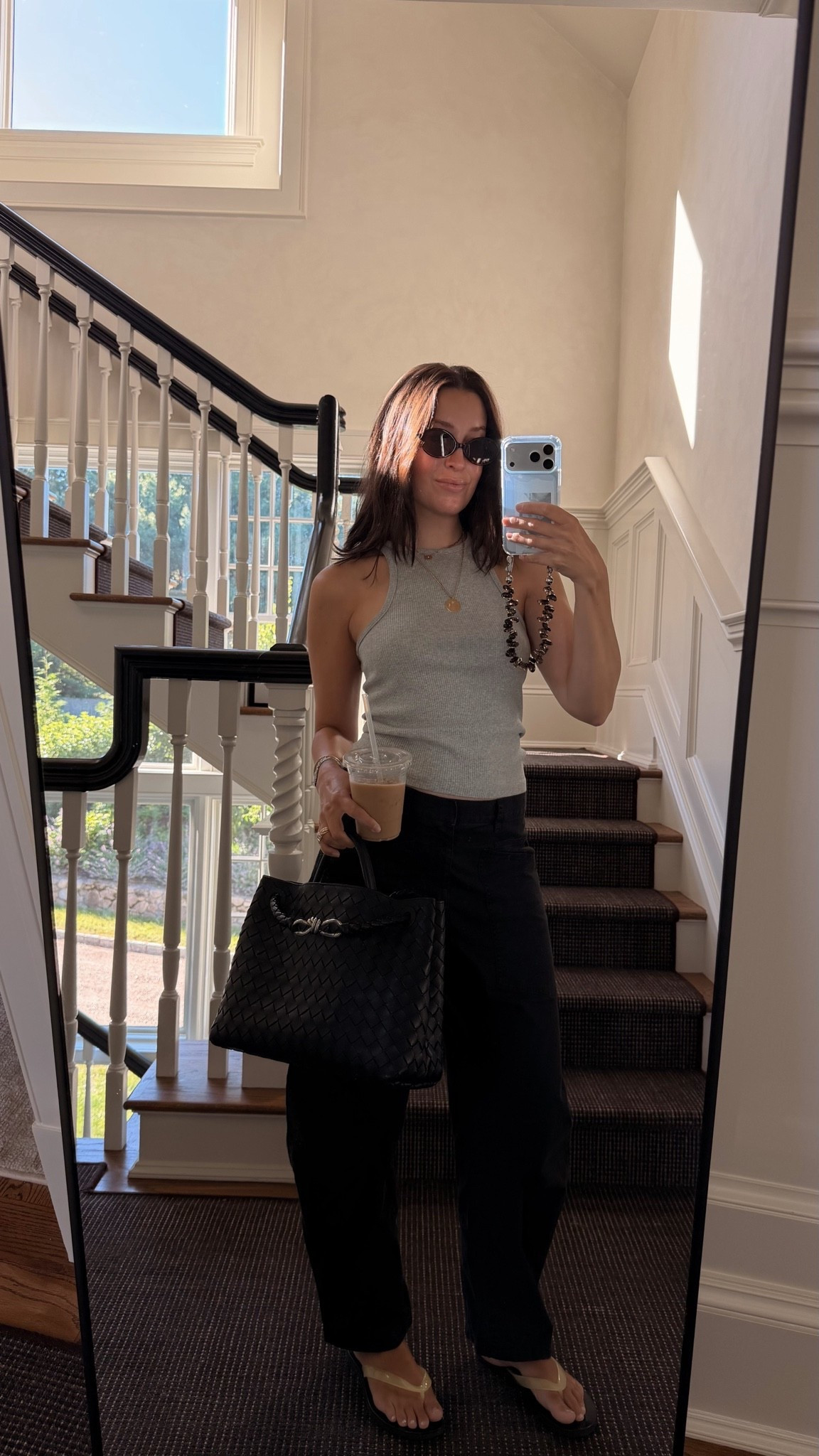 My tank is old j crew, linked the closest one to it! Size down in these pants!