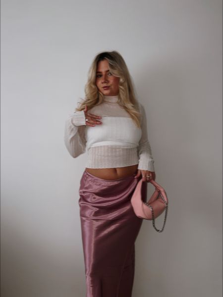 a sheer ribbed white long sleeve knit top with a bandeau tube top underneath, satin maxi low rise skirt in pink dusty rose and a pink by far shoulder leather bag for valentine’s day 

#LTKitbag #LTKeurope #LTKstyletip