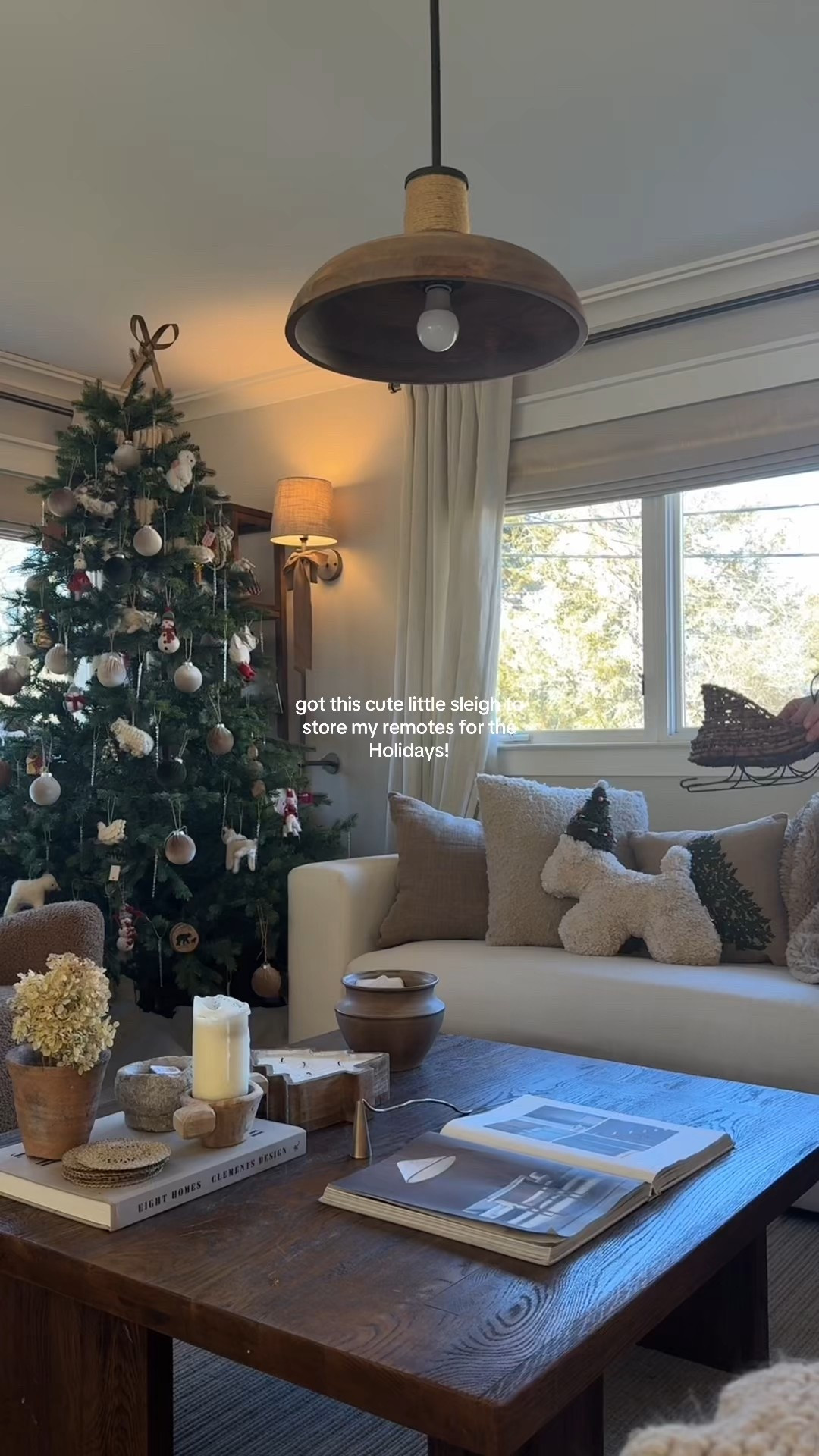 The cutest little sleigh for $9.99 to store all my remotes #coffeetabledecor #holidaydecor