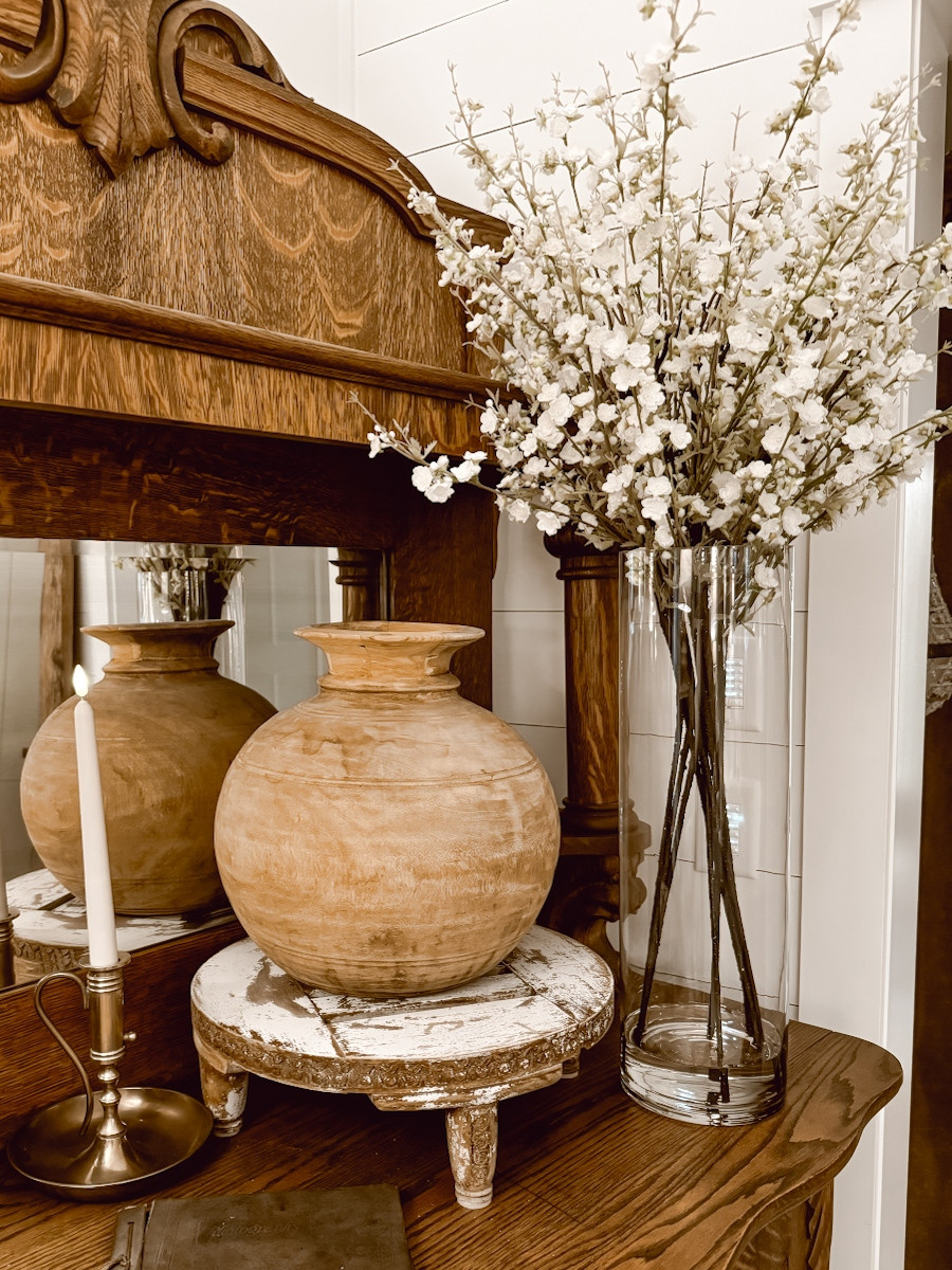 I am bringing back this artificial cherry blossom arrangement for Spring. What I love most about this piece is that it is 38" tall. It comes with the glass vase and the faux water in the bottom.  

 #LTKSeasonal #LTKHome #LTKFindsUnder100