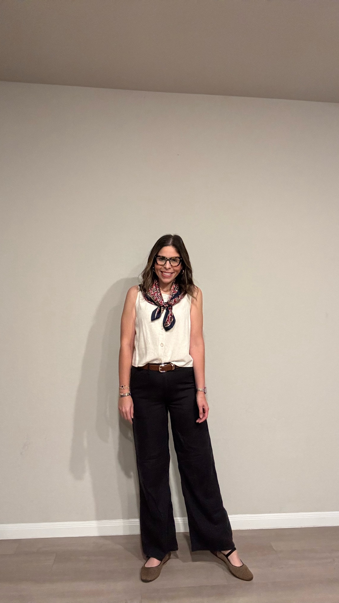 The neckerchief is doing all the heavy lifting today 👏 Cream sleeveless button-down, dark cargo trousers, cognac leather belt, and stacked bracelets — effortlessly put together without trying too hard #LTKstyletip #LTKover40 #LTKfindsunder100 

#LTKootd #LTKMidsize #LTKmomlife