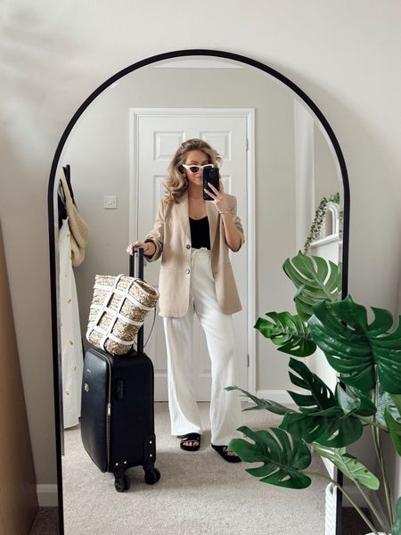 Neutral outfit, white trousers, travelling outfit, Katie Loxton suitcase, Goelia trousers, NA-KD blazer, asos, marks and Spencer sandals, white sunglasses, spring outfit 

#LTKstyletip #LTKspring #LTKuk