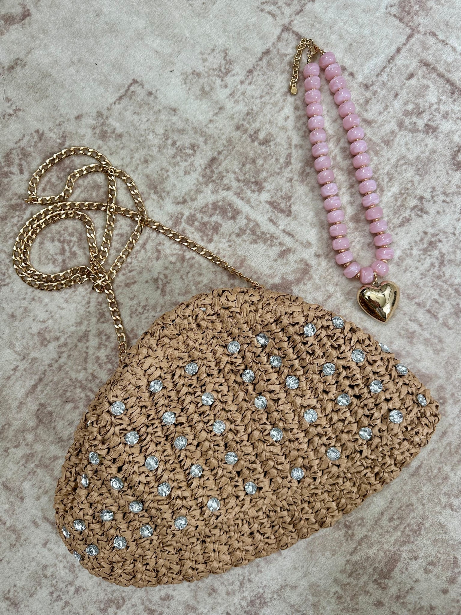 I’ve been on the hunt for spring / summer accessories and these Amazon purchases did not disappoint!

Straw clutch bag
Pink bead necklace with heart 
Vacation style 
Vacation accessories 

#LTKootd #LTKTravel