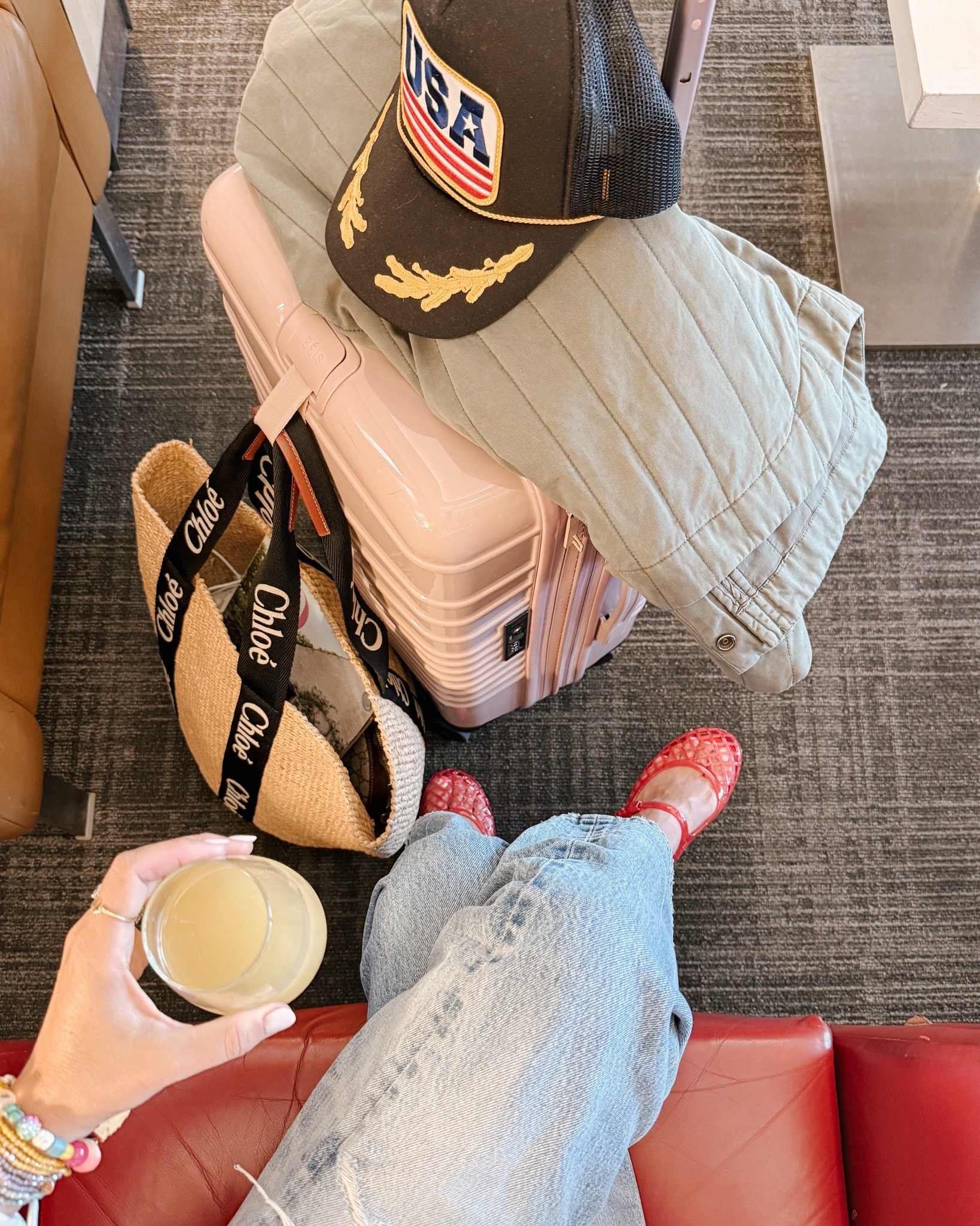 24hr in Manhattan beach on a quick girls trip, here's what I packed. From comfy airport layers to walkable sandals and my go-to travel tote, these are the pieces I reach for when there’s no time to overthink it.

Outfit includes:
✔️ vintage-style jeans
✔️ red jelly sandals (yes, I brought both pairs)
✔️ oversized jacket for the flight
✔️ graphic trucker hat
✔️ pink carry-on
✔️ layered travel bracelets
✔️ straw Chloe tote (fits everything)

#LTKtravel #LTKstyletip #LTKunder100 #ManhattanBeachStyle #LTKspringstyle #travelstyle #girlsgetaway #weekendpackinglist #carryononly #momstyle #chloetote #vacationoutfits #airportstyle