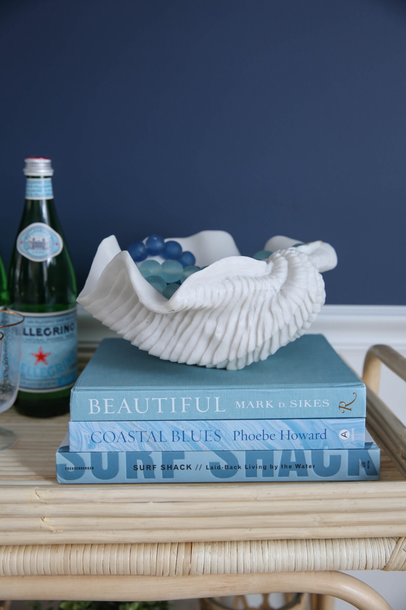 The smallest details matter the most! Tabletop and shelf styling decor is how you really pull a room together! Love these coastal coffee table books and recycled glass beads! 

#LTKFindsUnder50 #LTKSaleAlert #LTKHome