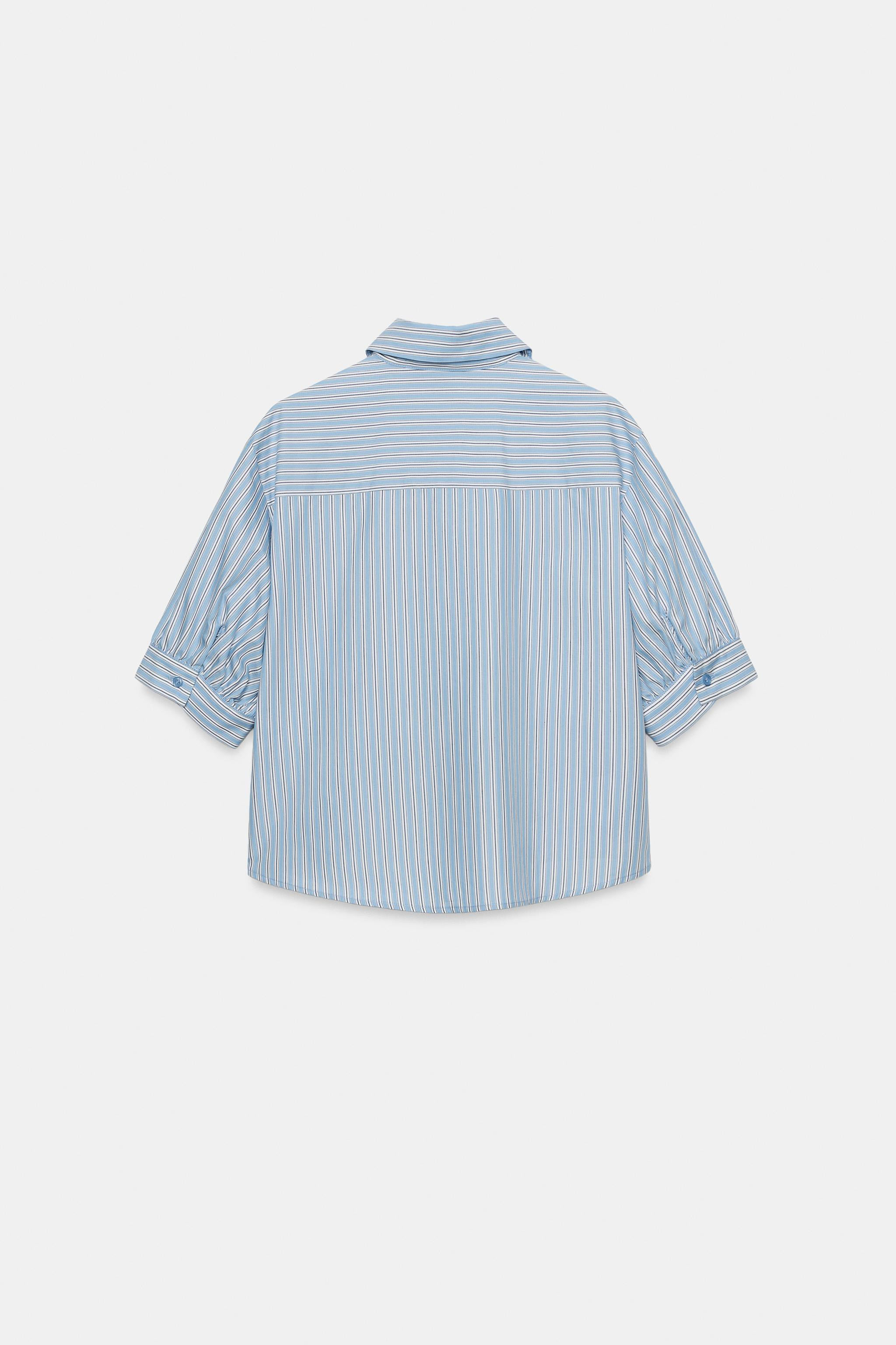 Shirt with a lapel collar and short puff sleeves. Features sequin detail on the front. Front clos... | Zara US