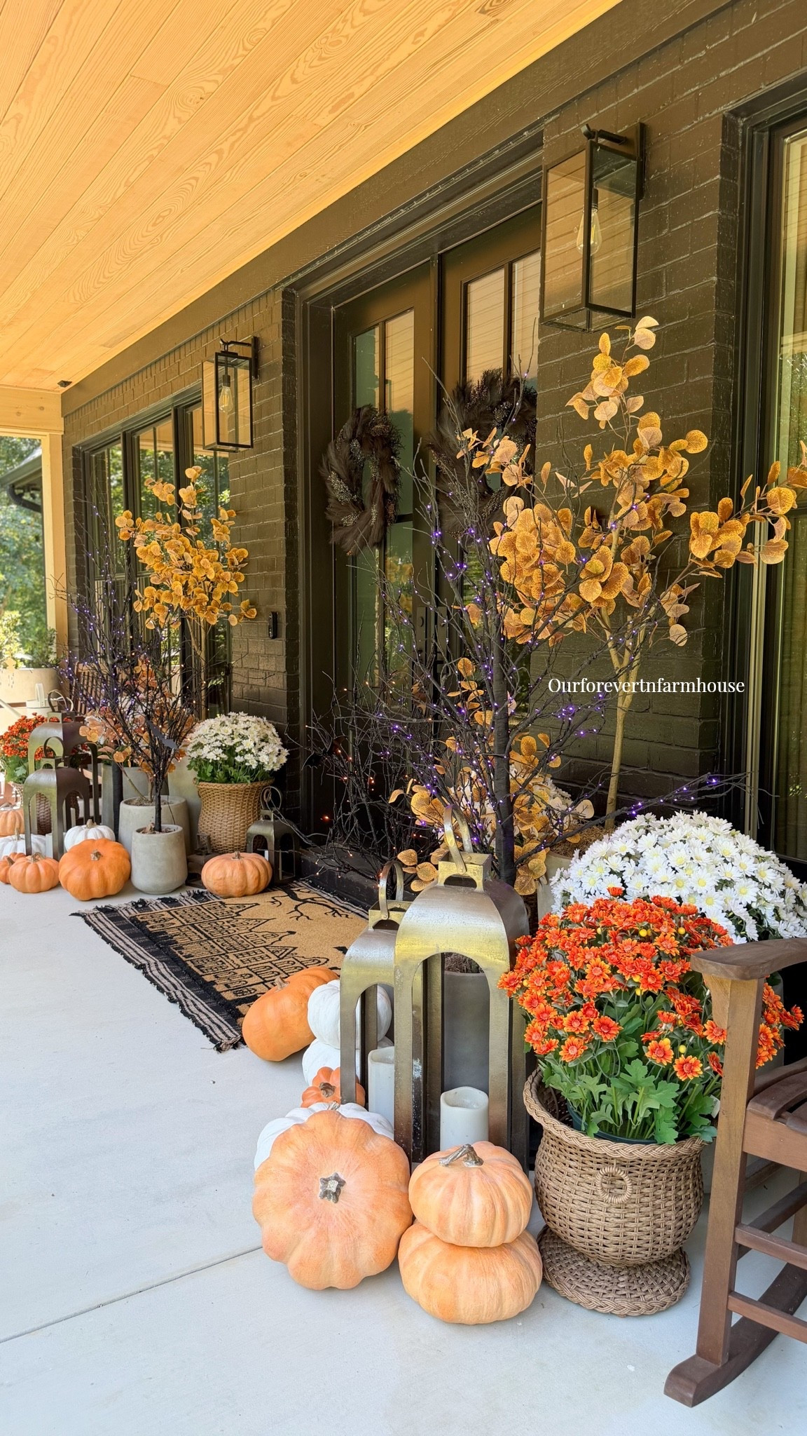 It’s never too early to decorate for spooky season… especially when you have a black house. 👻🖤😂

I had so much fun bringing a little fall and Halloween together on the porch with @nearlynatural! I mixed their fall eucalyptus trees with their black lighted Halloween trees, and I love how they all look together. The larger black trees switch between orange and purple lights, while the smaller orange-lit trees have the cutest little bats tucked into the branches. 🦇🎃

Add in a few pumpkins, lanterns and faux mums, and I think our porch is officially ready for spooky season. 👻🖤

#LTKSeasonal #LTKHome