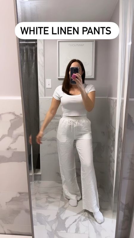 H&M white linen wide leg pants. Wearing an xs. True to size 