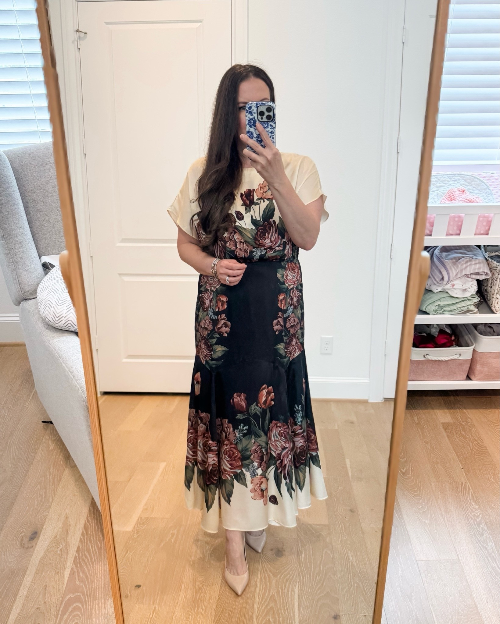 This floral maxi dress is such a pretty fall transition dress for those of us still dealing with hot weather!  The short sleeves keep it comfortable now, while the rich floral print and darker tones give it that early-fall feel.

I also love this as a work dress or office outfit — polished enough for the office but still feminine and easy to wear. Pair with sandals or flats while it’s warm, then switch to boots and add a blazer or jacket when temperatures cool down.

Perfect for fall transition outfits, hot weather fall outfits, work dresses, office outfits, floral dresses, business casual outfits, summer-to-fall fashion, wedding guest dress and elevated everyday style.

Save this one if you’re looking for ways to dress for fall when it still feels like summer!