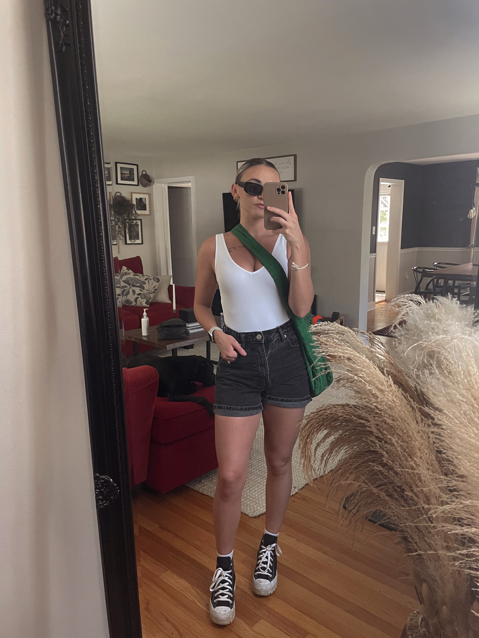 Jean shorts, quilted green bag for a pop of color, converse 

White tank, jean shorts, converse, casual outfit

#LTKunder50 #LTKunder100 #LTKSeasonal