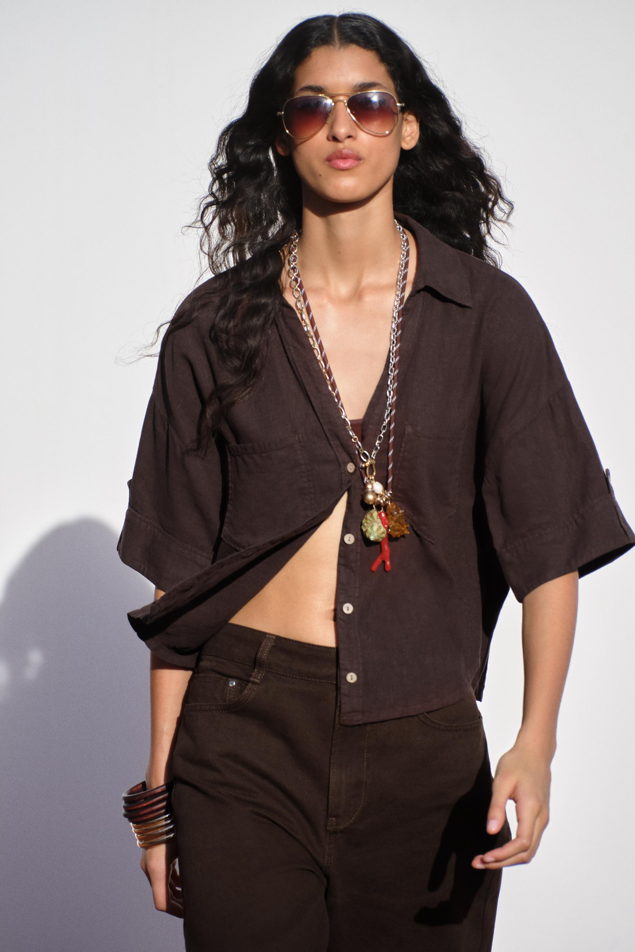 Linen shirt. Lapel collar with V-neck and short sleeves. Front patch pockets. Front button closur... | Zara US