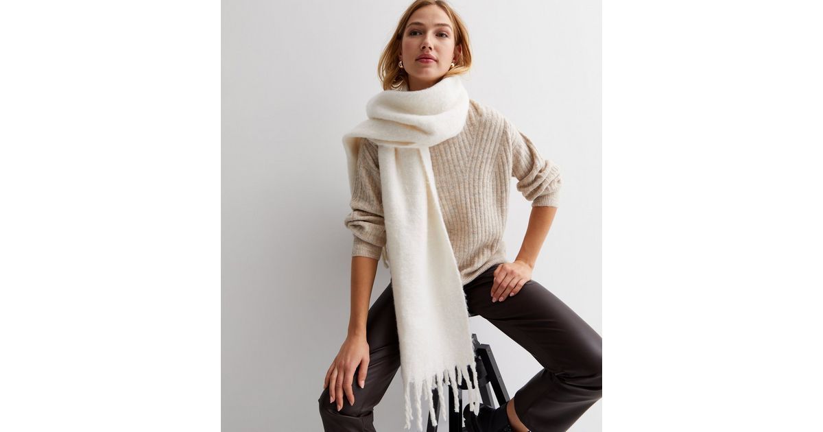 Cream Knit Long Tassel Scarf
						
						Add to Saved Items
						Remove from Saved Items | New Look (UK)