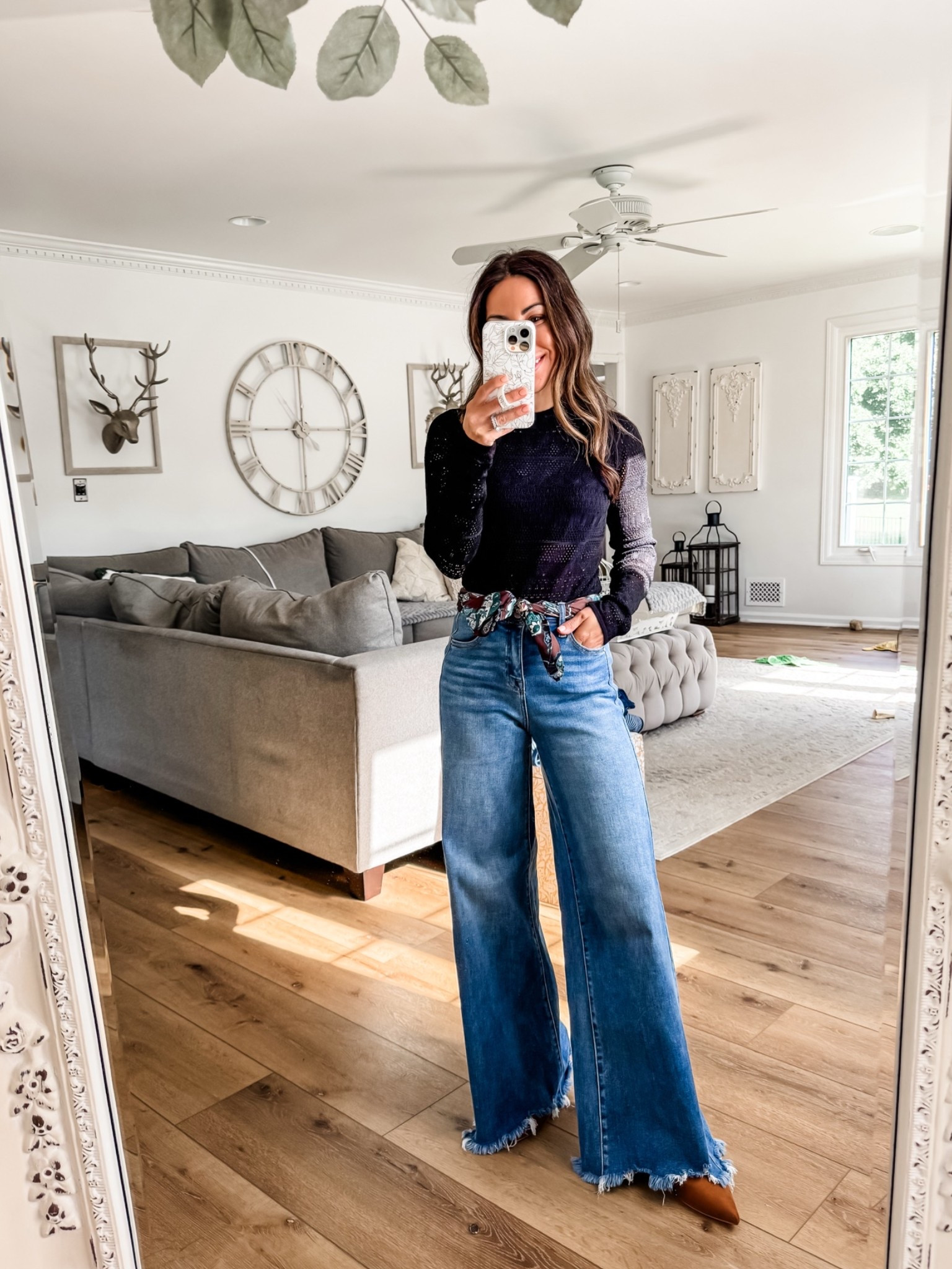 Small black sweater. 25 wide leg jeans. Date night outfit.

#LTKOver40 #LTKPetite