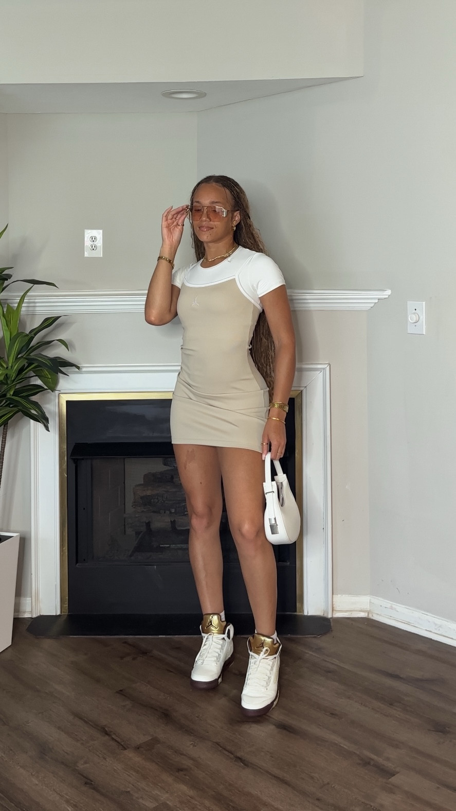 Styling the Jordan 5 Retro “Golden Ticket” sneakers in two different ways 👟💫

1️⃣ Sporty streetwear outfit – LA jersey + biker shorts + brown statement bag.
2️⃣ Chic neutral outfit – Jordan tank dress + white top layer + white mini bag.

The Jordan 5 Golden Ticket is the perfect sneaker to dress up or down, whether you’re going for casual street style or a more elevated chic look.

Which fit are you rocking first — sporty or chic?

#LTKShoeCrush #LTKStyleTip