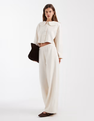 Miss Selfridge soft rib co-ord in cream

PRODUCT INFORMATION
Items sold separately. Please add each item to your bag.


Miss Selfridge soft rib cardigan with peter pan collar co-ord in cream
£29.99£29.99
Pay in 3 interest-free payments of £10.00 with  
COLOUR:CREAM
SIZE:
Size Guide


ADD TO BAG
Free delivery on orders over £40.00. Standard delivery £4.50
Free returns on qualifying orders.
View Delivery & Returns rates
This product has shipping restrictions.


Miss Selfridge soft rib wide leg trouser co-ord in cream
£28.99£28.99
Pay in 3 interest-free payments of £9.67 with  
COLOUR:CREAM
SIZE:
Size Guide


ADD TO BAG
Free delivery on orders over £40.00. Standard delivery £4.50
Free returns on qualifying orders.
View Delivery & Returns rates
This product has shipping restrictions.
 | ASOS (Global)
