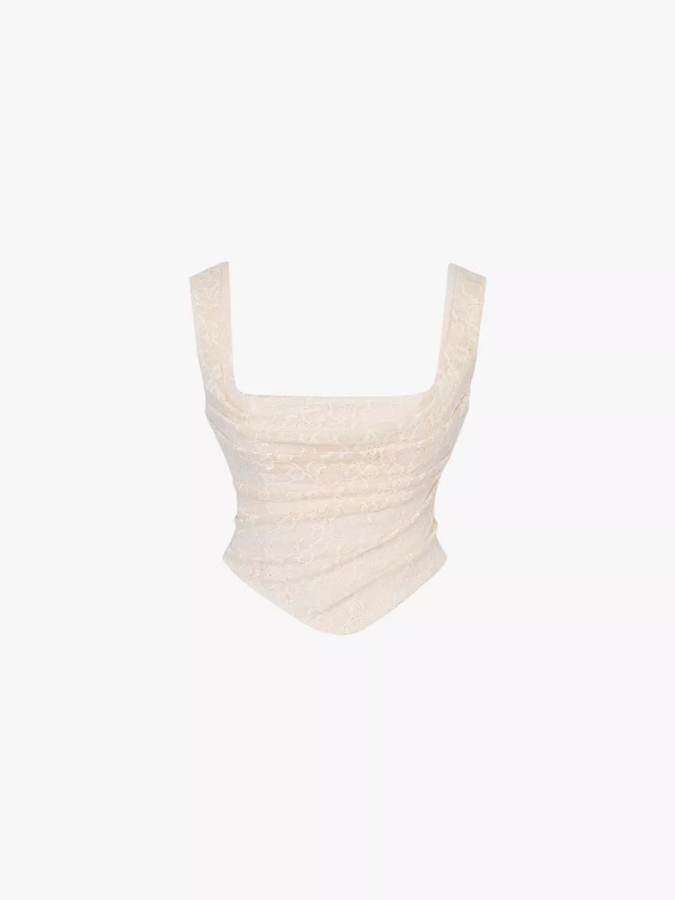 Una corseted stretch-woven top | Selfridges
