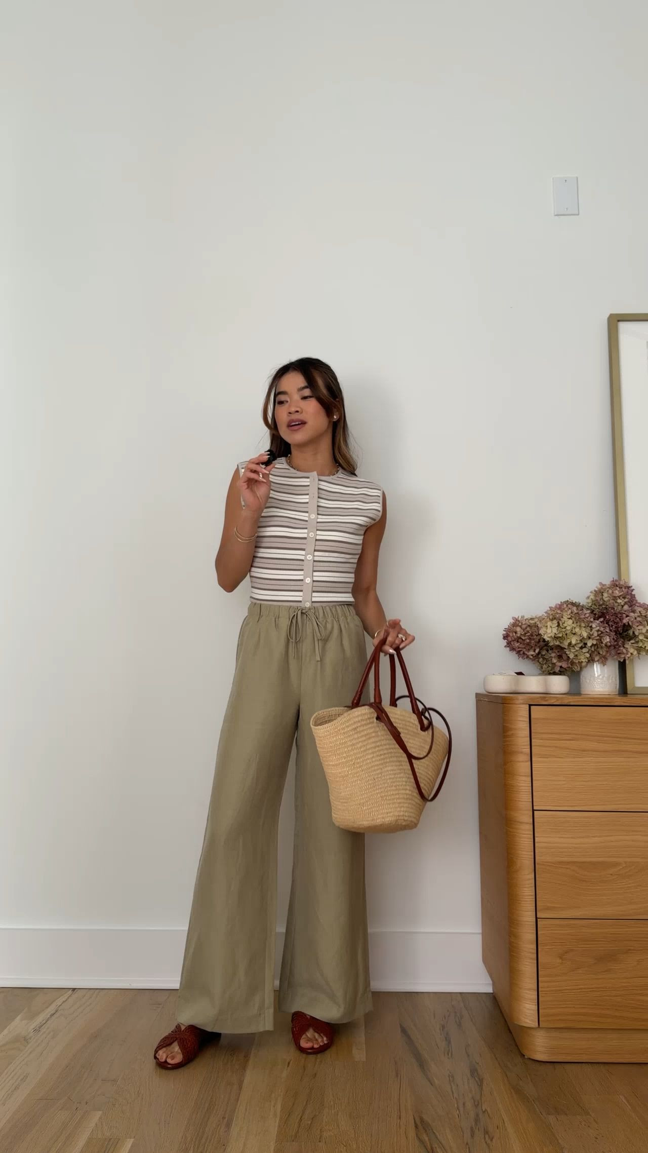 The perfect summer top from @Aritzia! I love how flattering it is.

Sizing info:
-Aritzia Golightly Sleeveless Cardigan (Size XS in Mtrpls Taup /Lt Brch) 
-Aritzia Lodge Pant Cruiselinen (Size 2XS Short in Martini Olive) 
-Sezane Low Paola Mules - Mohogany Smooth Braided 

Petite style, petite fashion, mom outfit, mom style, petite pants, petite outfit ideas, petite outfits, best pants for petite, petite pull on pants, spring style, spring outfits, beach outfits, vacation outfits, summer outfits, Summer style, summer trends, summer linen pants, aritzia pants, petite aritzia

#LTKootd #LTKSeasonal #LTKPetite