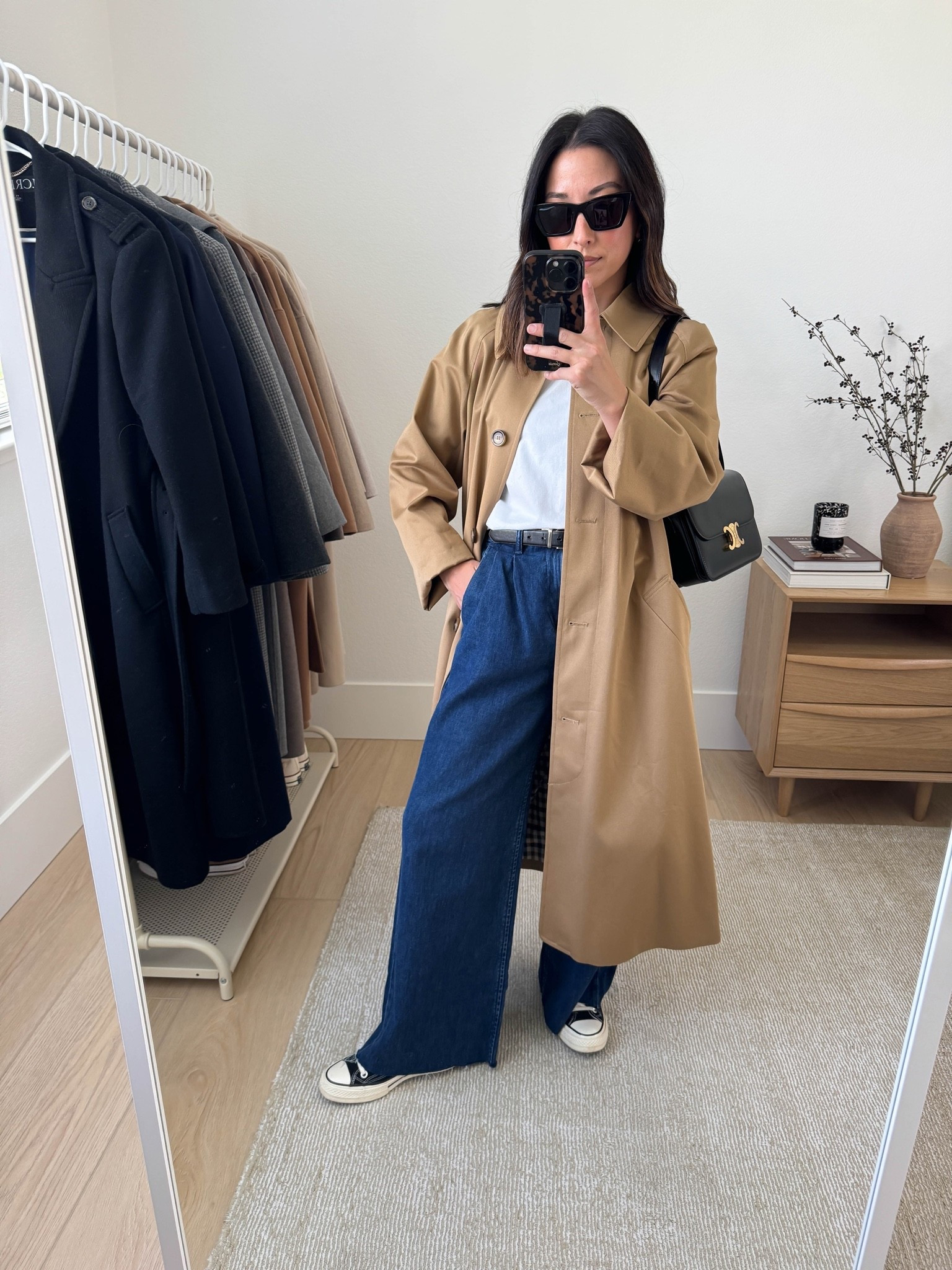 casual workwear outfit idea with jeans. 

Sezane trench 2
Madewell tee xs
Calvin Klein belt
Gap trouser jeans 25 regular (cut hem)
Converse sneakers 5
Celine Triomphe bag medium
YSL sunglasses

#LTKSeasonal #LTKPetite #LTKWorkwear