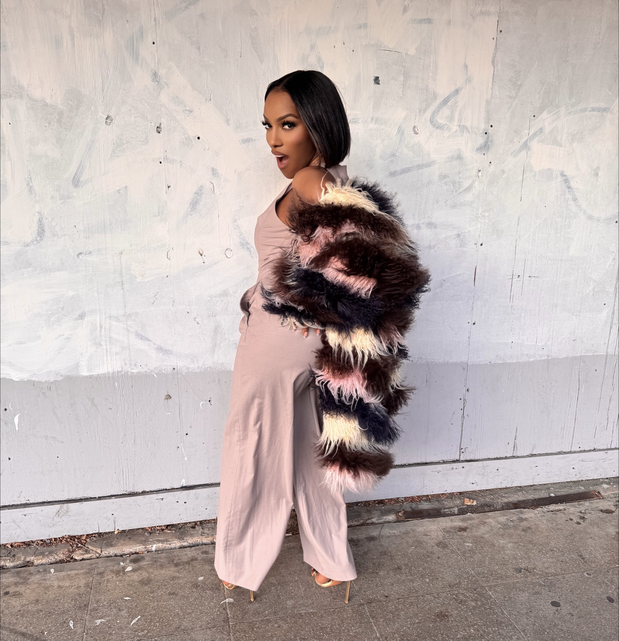 A coat that brings in some main character energy 

#LTKdatenight #LTKFashionMonth #LTKstyletip