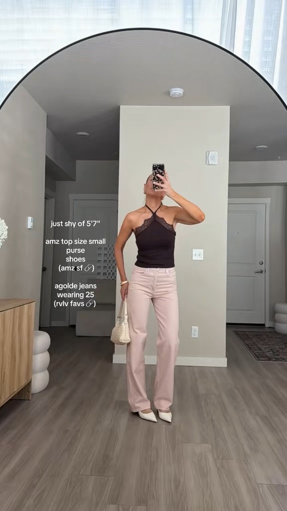 I’m
5’7’ wearing 25 in agolde and small in top. 
The bag is super high quality and worth every penny!