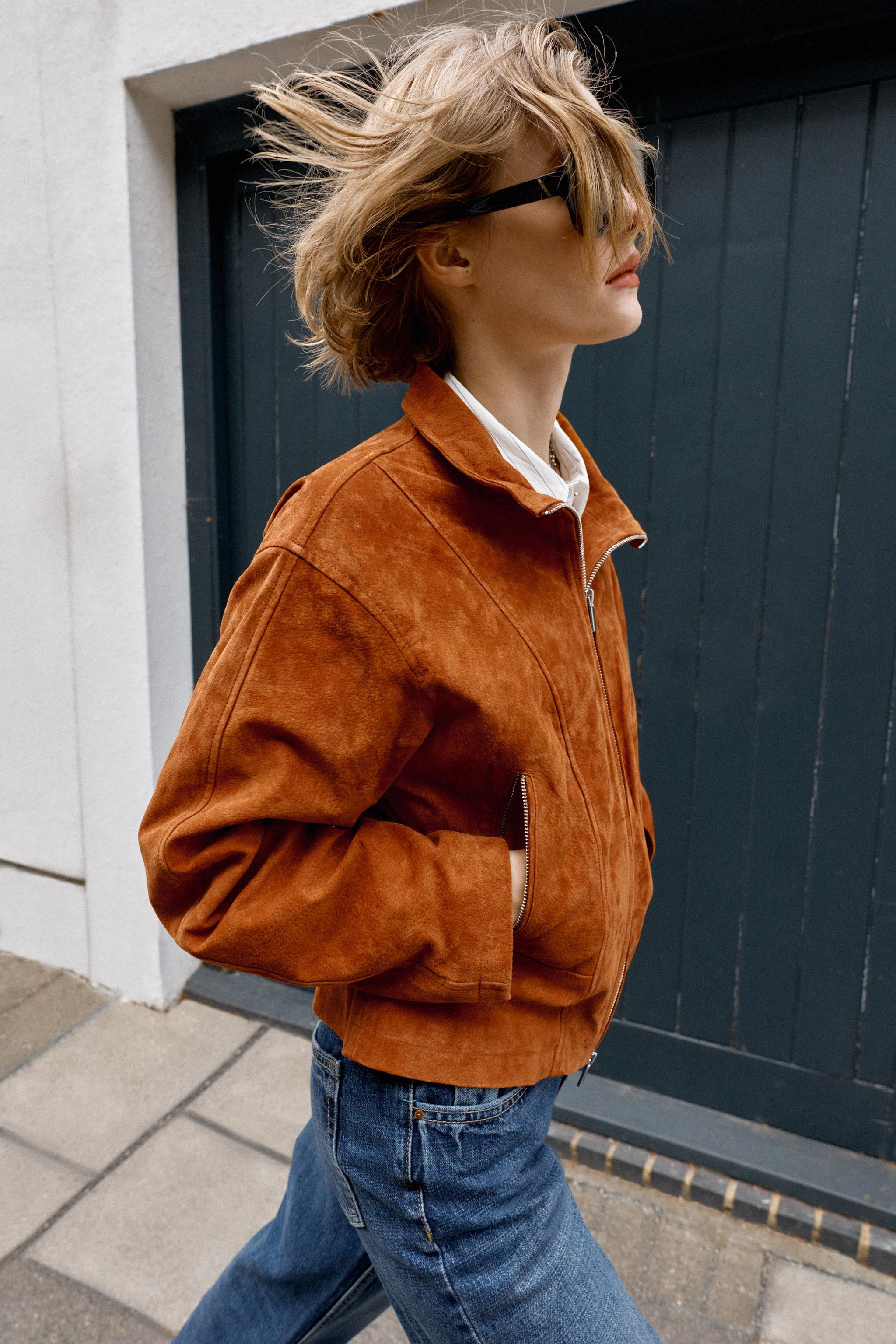 Jacket crafted from 100% premium leather. Features a stand collar, long sleeves, and front pocket... | Zara Canada