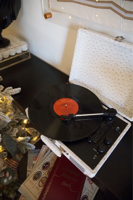 The ostrich record player I live pulling out for my grandparents vinyls.

#LTKhome #LTKHoliday #LTKGiftGuide