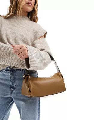 ASOS DESIGN slouch shoulder bag with stud detail in brown | ASOS (Global)