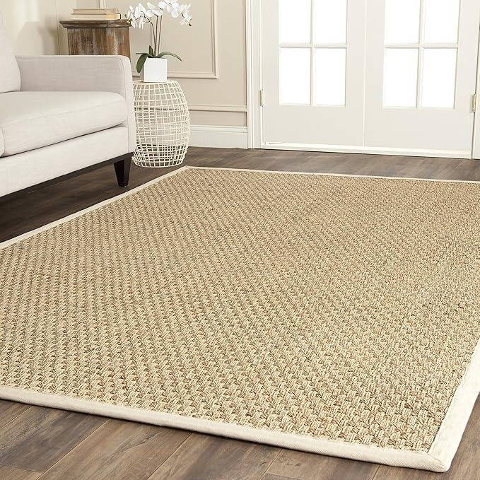 SAFAVIEH Natural Fiber Collection Area Rug - 6' x 9', Natural & Ivory, Border Basketweave Seagras... | Amazon (US)