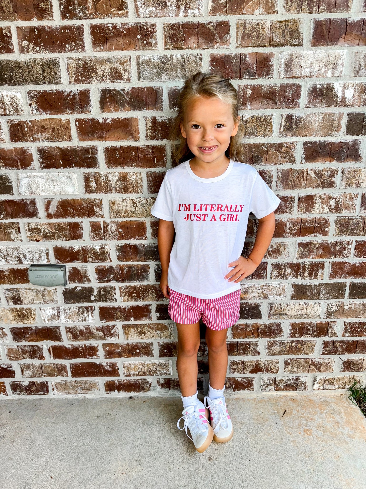 Adley’s wearing her normal sizes- shirt 5T and shorts 4T