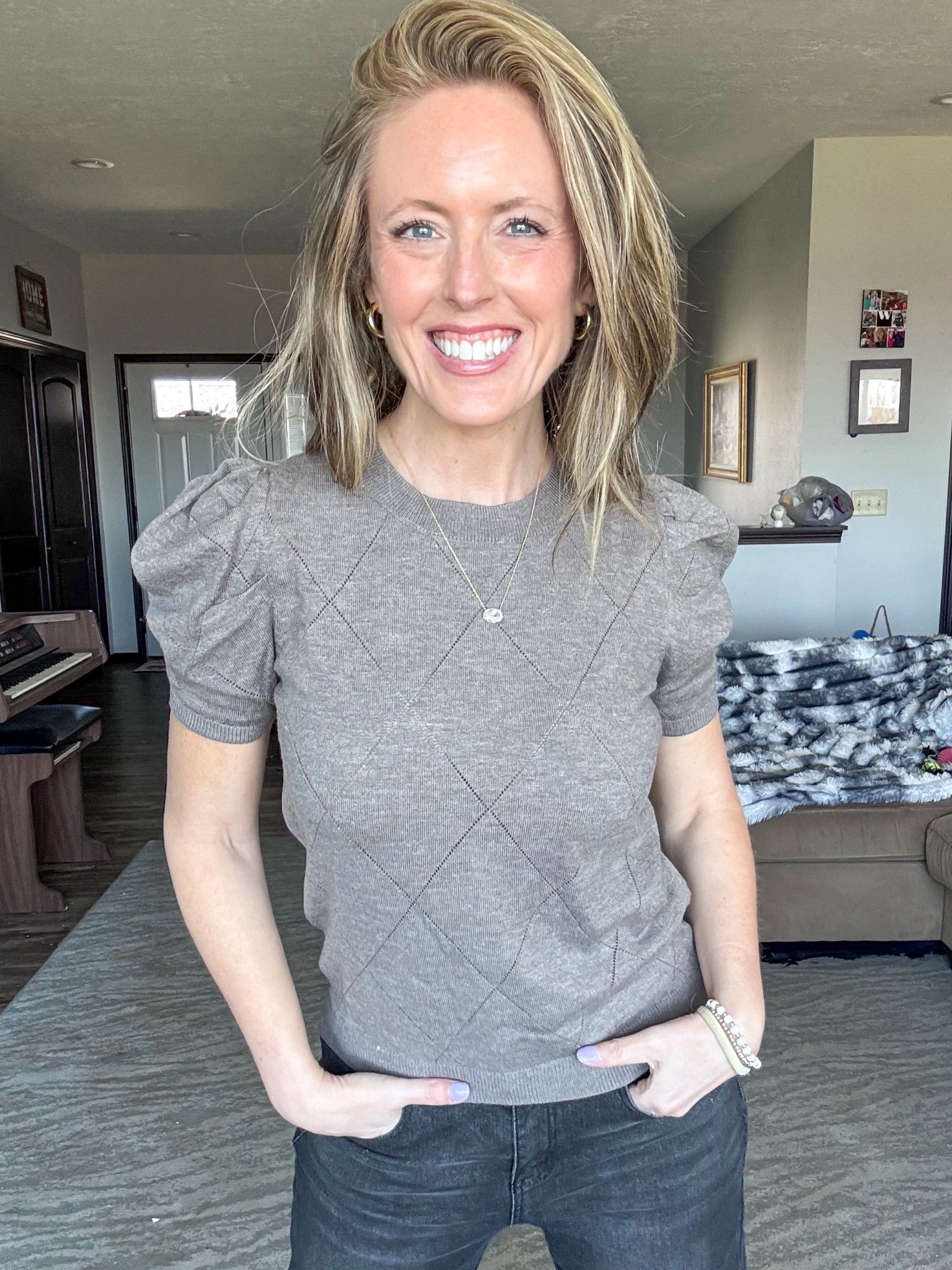 Love a good short sleeved sweater and this one is so good! 🤎 Loving this neutral color and overall fit. Wearing a small.

As an Amazon Influencer I earn commission on qualifying purchases.

Brown short sleeved sweater, mom style, wear to work attire, spring fashion 2026, casual shirt sleeved sweater 

#LTKOver40 #LTKootd #LTKWorkwear