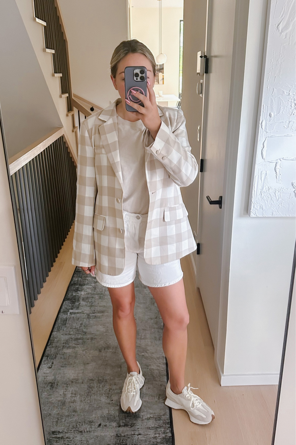 Summer to fall transition outfit.
Oversized gingham blazer - wearing a Medium.
Long white shorts - true to size. I ordered a size up for a boyfriend look, but would recommend getting your regular size because they do break in.
New Balance 327 Sneakers - TTS.

#LTKSeasonal #LTKstyletip #LTKworkwear