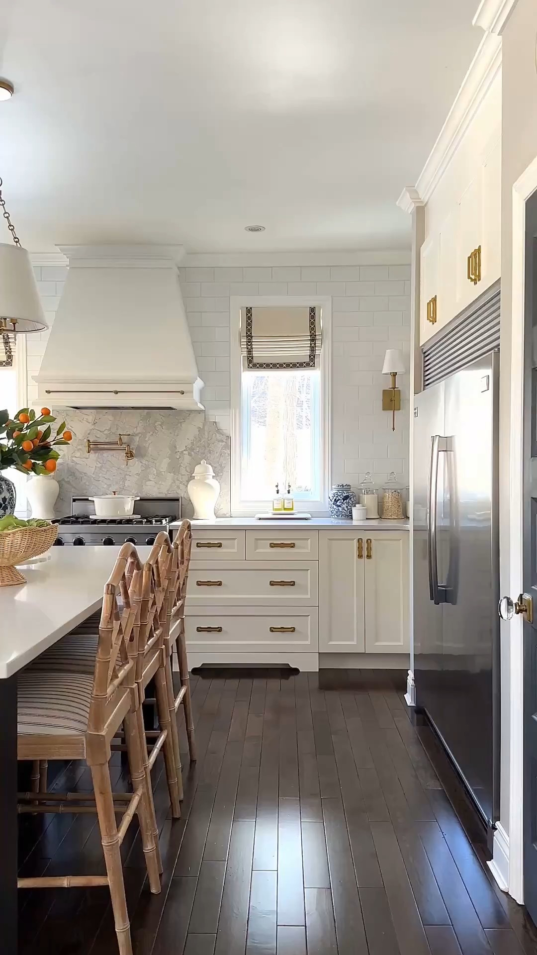 Gorgeous spring kitchen decorating ! Tangerine branches, faux apples, artichokes, pears, blue and white chinoiserie, rattan footed bowl 

#LTKHome #LTKSeasonal