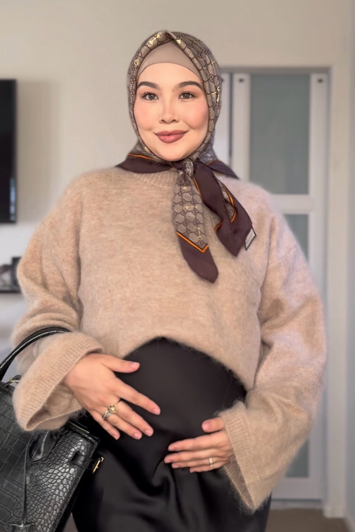 Baby bump style 
Modest fashion 
Hijab styles 
Satin black skirt 


#LTKworkwear #LTKbump #LTKstyletip