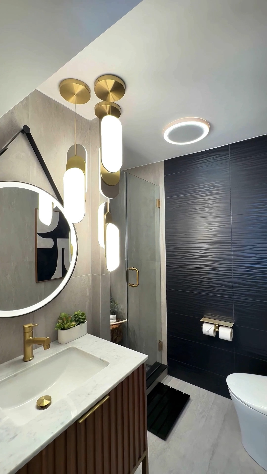 Are you team moody or light and airy bathroom space? I honestly love both, but this moody bathroom really won me over. It’s one of my favorite bathroom styling moments 🖤. It’s the warm accents, soft textures and small details that make the space feel inviting. It’s always the little things for me. 

#LTKSaleAlert #LTKdayinmylife #LTKHome