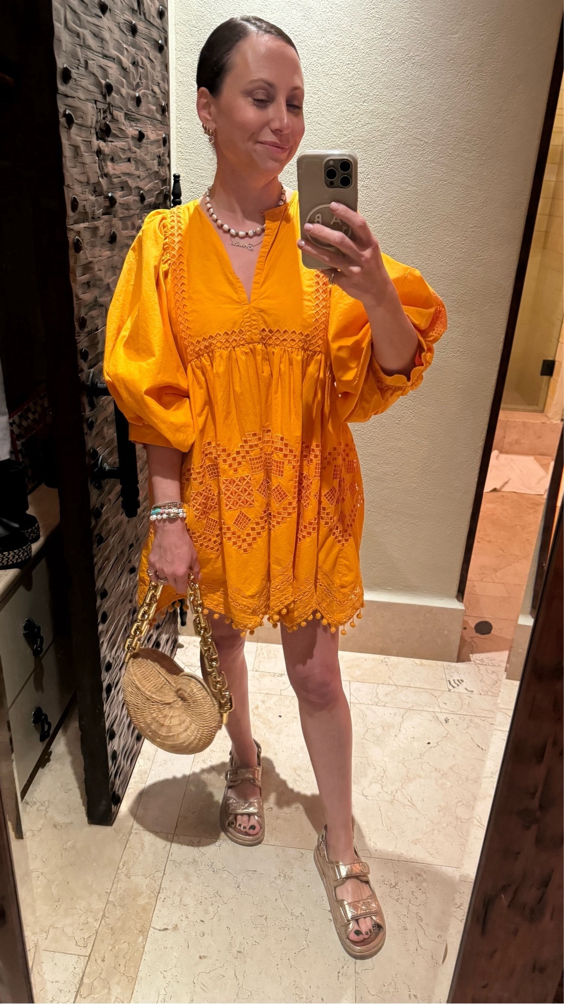 When you go to Cabo, you have to option for color and that’s exactly what this gorgeous mid length orange dress does. I put it with the cutest, metallic sandals, and of course a WICKED wicker bag! This outfit with the jewels was giving me “tropical trinket” vibes! #Orange #Bright #Bold #PopOfColor #Beach #Flirty #Lace #MidiDress #FlowyDress #Sandals 

#LTKstyletip #LTKSeasonal #LTKtravel