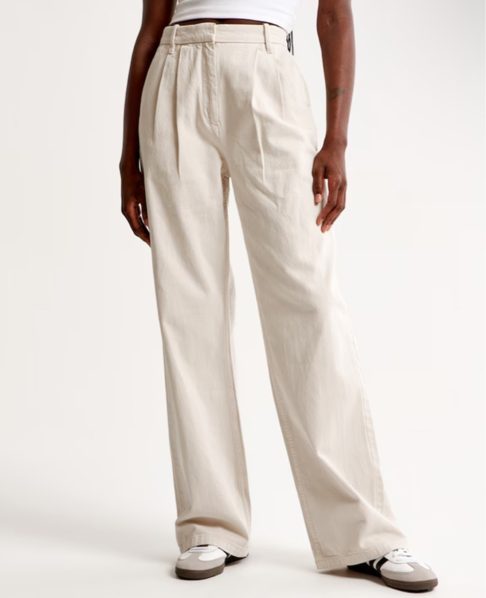 The signature A&F Sloane Tailored Pant in an everyday menswear fabric, that's perfect for dressing up or down. The Sloane Tailored Pant is an ultra-high rise tailored wide leg pant with figure-flattering pleating details, a functional fly and pockets and a partially elasticated waistband for ultimate adjustability. The intended length hits the bottom of a flat shoe.

#LTKworkwear #LTKunder100 #LTKSeasonal