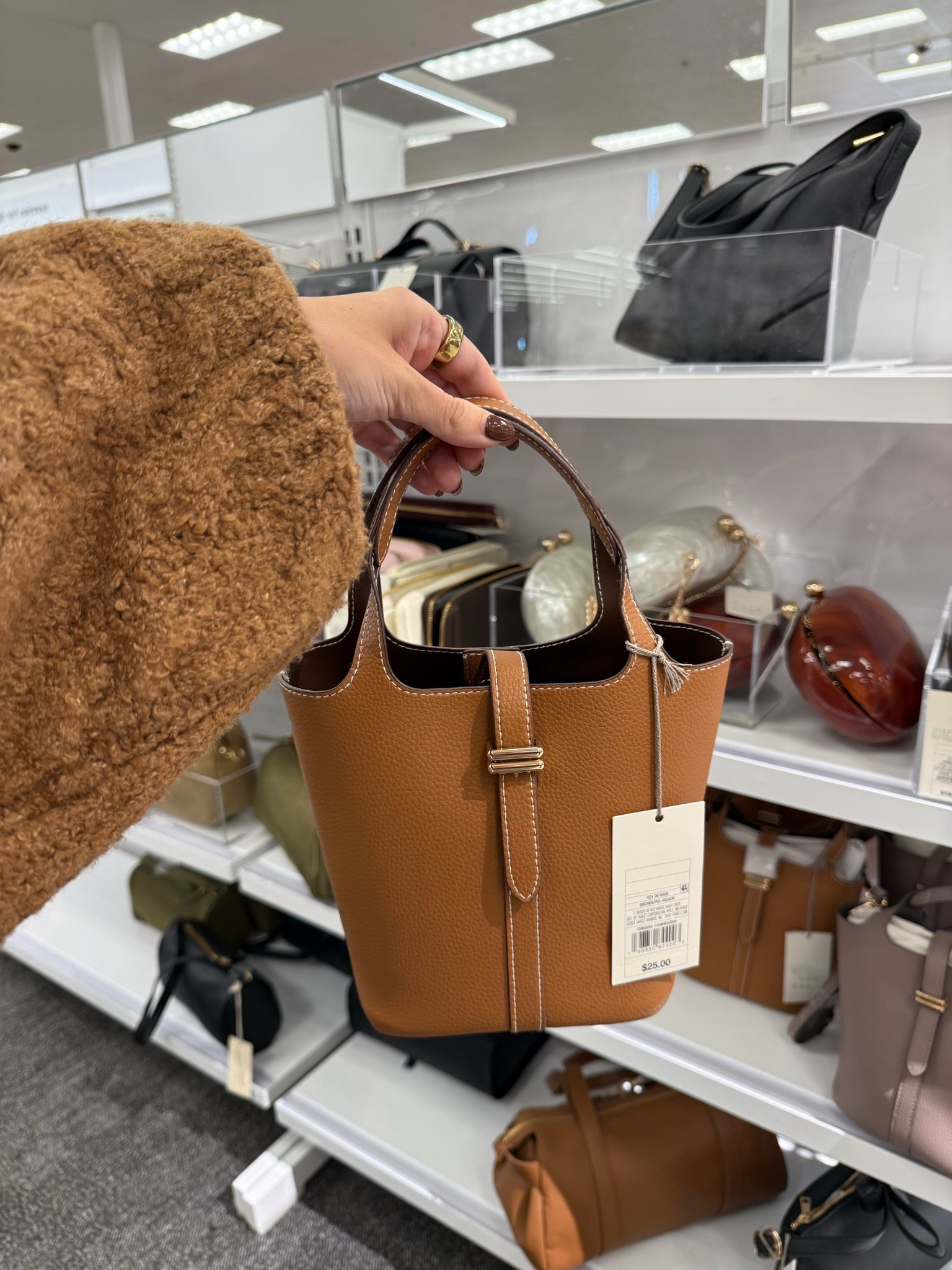 This $25 bag reminds me so much of the Hermès Picotin bag!

#LTKmomlife #LTKootd #LTKTravel