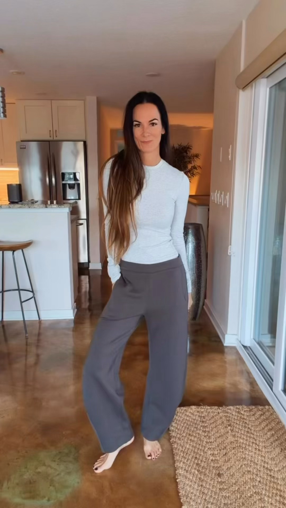 Comfortable pants, a very put-together outfit. 🩶 Styling the RUTI On The Loose Work Scuba Pants in Storm Gray with a fitted long-sleeve top, sneakers, a sweater over my shoulders, and a pop of purple. An easy outfit idea for travel, errands, or a casual lunch. Use NICOLE15 for 15% off RUTI.

#LTKdayinmylife #LTKgrwm #LTKootd