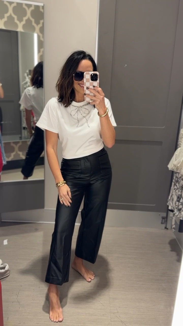 Embellished short sleeve top paired with faux leather pants.
An easy, chic, and elevated holiday look ✨

Holiday party look, chic style, bow t-shirt, rhinestone top, Target style, VintagePickin



#LTKStyleTip #LTKHoliday #LTKFindsUnder50