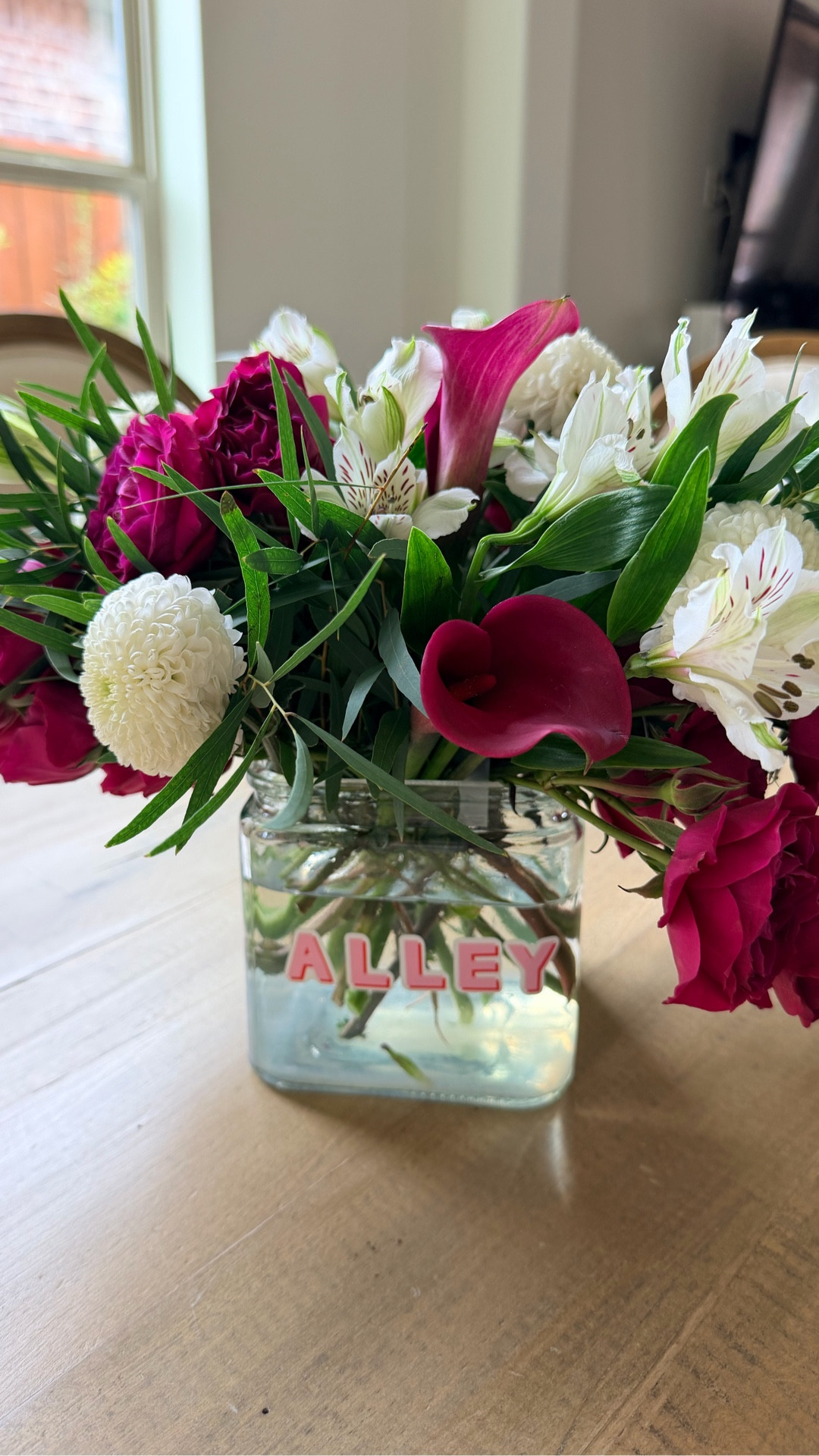 Add Joy Creative’s Shop’s vinyl stickers to a vase to personalize it!

Use code JANELLE10 for 10% off.