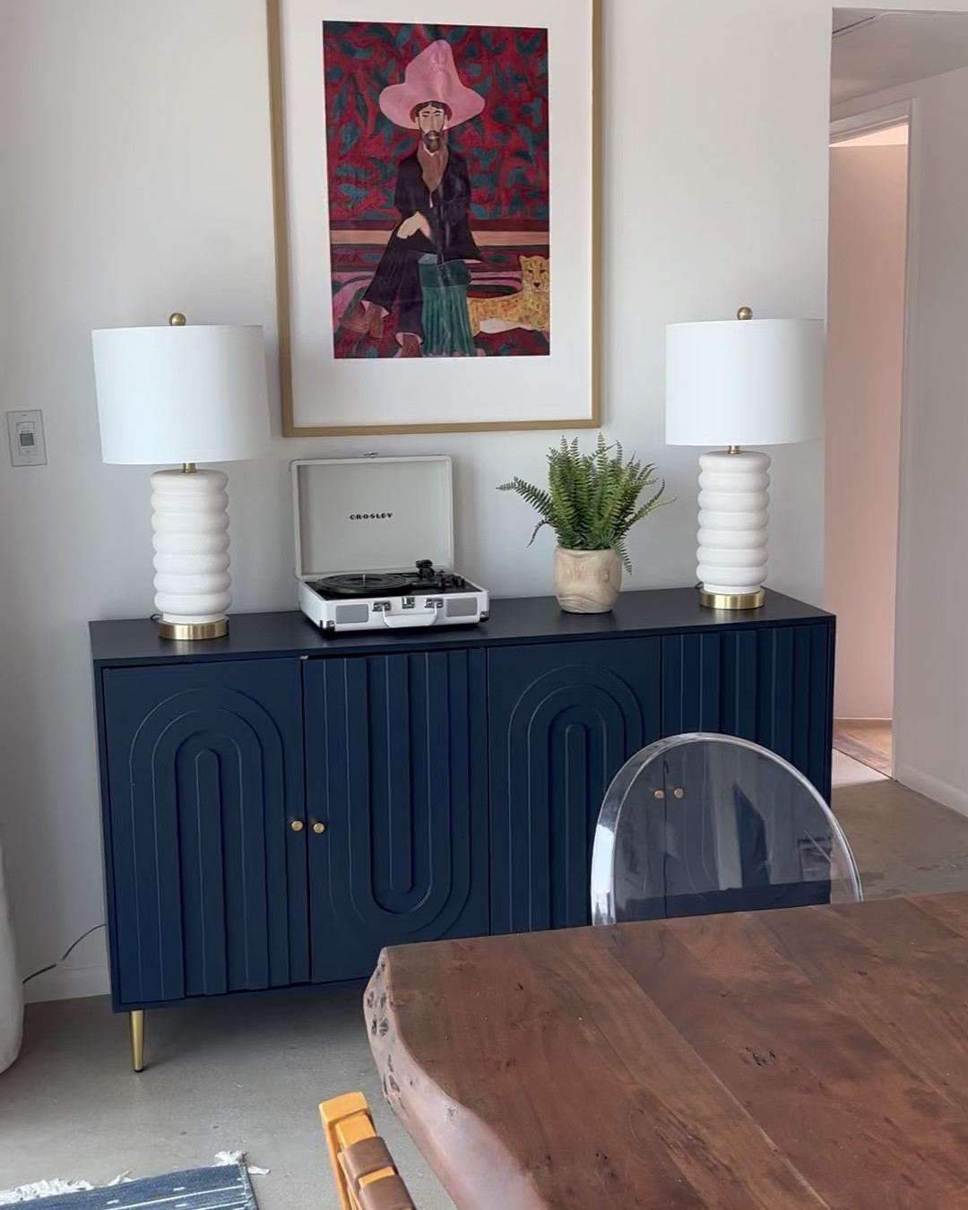 Level up your Airbnb with a few upgrades 👉 swipe to see the before photos.  
I got a much larger statement dining table and oriented it the other direction but I kept the chairs.  
I got a new sectional in a fun color - bonus that it doesn’t show stains or wear and tear as much when you go for a darker color couch.  
I added some fun art and a rug.  You can make a statement in a vacation property 🌵🤠

#LTKHome #LTKTravel