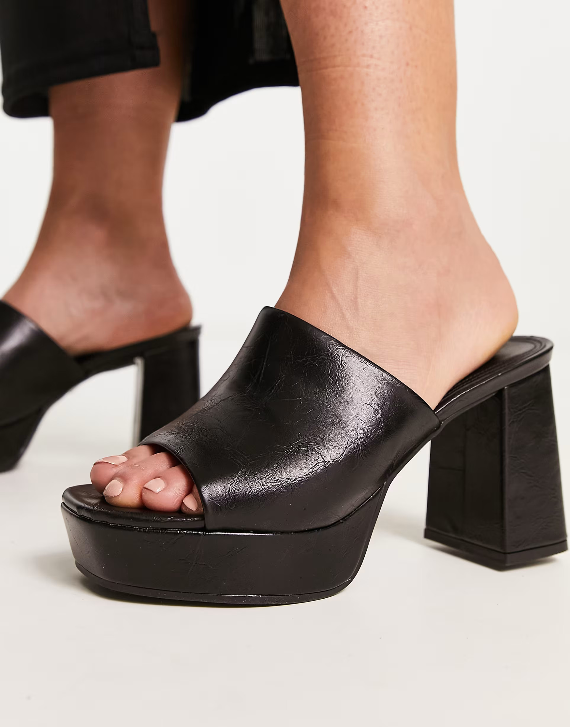 ASOS DESIGN Wide Fit Harmonize mid heeled platform mules in black | ASOS (Global)