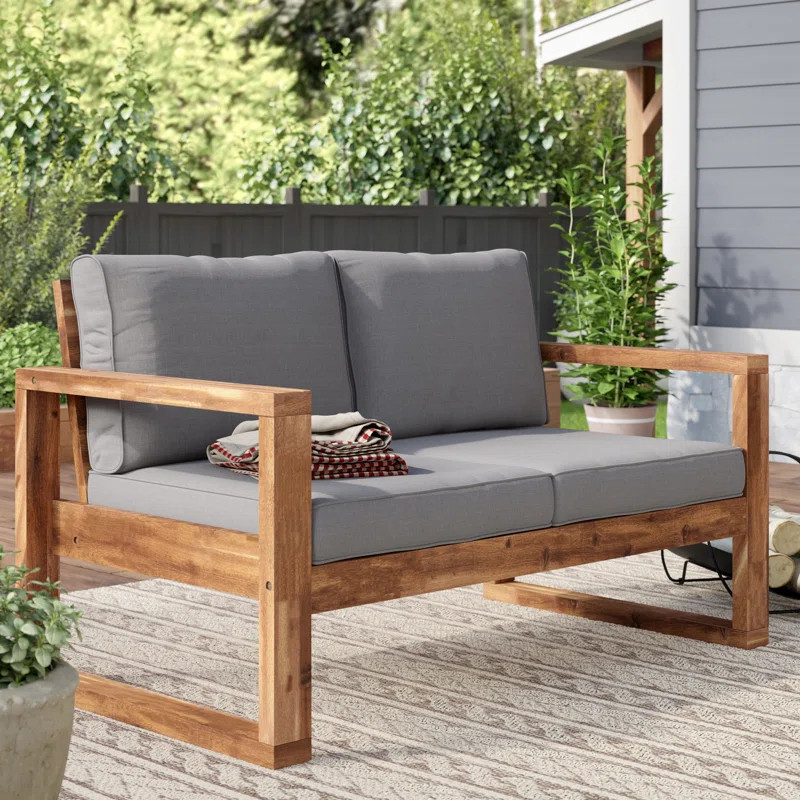 Mikiyasi 52'' Wide Outdoor Loveseat with Cushions | Wayfair North America