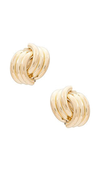 SHASHI X Revolve Knot Earrings in Metallic Gold. | Revolve Clothing (Global)