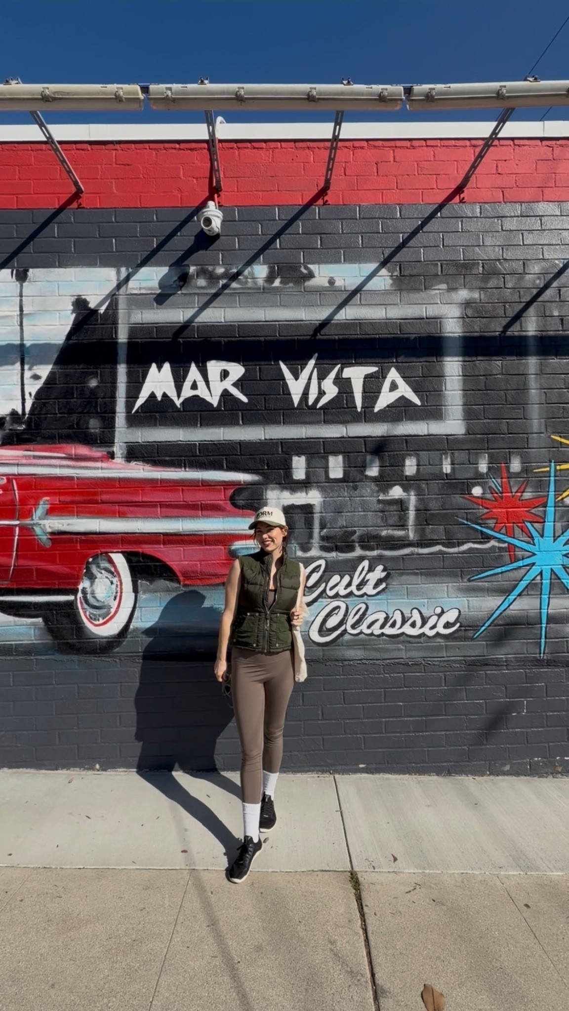 Sundays are for the Mar Vista farmers market! Wearing FORM workout set with a true religion vest and Vivobarefoot sneakers 👟 