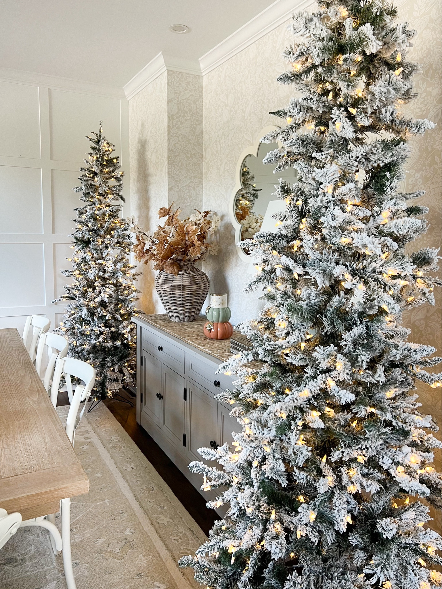 This flocked tree is actually from Amazon! This is the 7.5 ft slim tree but regular widths are available if you don’t need a slim option. Multiple tree heights are also available. It comes with a remote and has different light features  

#LTKSeasonal #LTKHoliday #LTKHome