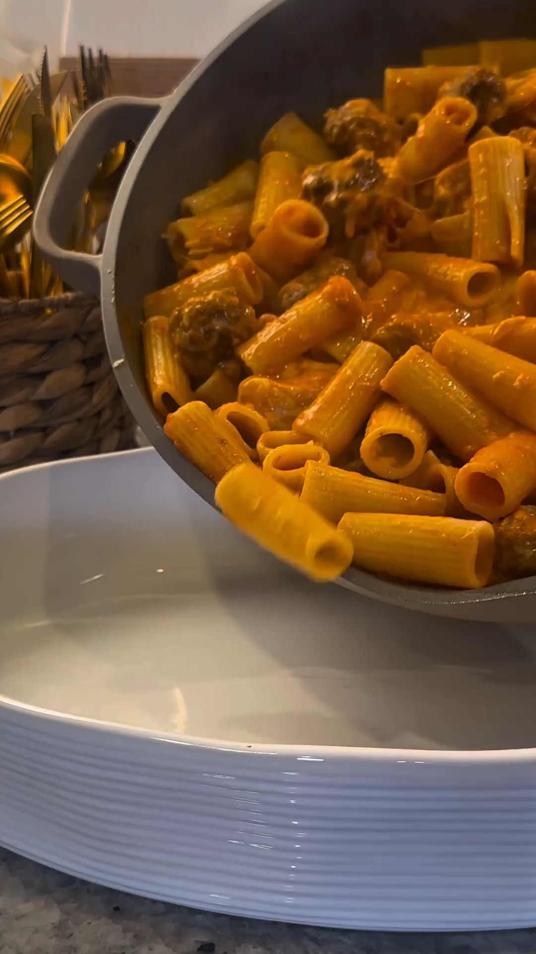 Sometimes spaghetti just feels… predictable. You twirl it, you eat it, and it’s good, but it’s the same story every time. The other night I wanted pasta night to feel a little different, so I swapped spaghetti for rigatoni and rolled tiny meatballs instead of the usual big ones. Something about those bite-sized meatballs tucked into the ridges of rigatoni just hit differently. Cozy, comforting, but fresh enough to make it feel like a whole new dish. 🍝✨

Meatball Rigatoni Recipe
	•	1 lb ground beef (or mix beef + pork)
	•	1 egg
	•	½ cup breadcrumbs
	•	½ cup grated parmesan
	•	3 cloves garlic, minced
	•	2 tsp Italian seasoning
	•	Salt + pepper
	•	1 jar marinara sauce @jerseyitaliangravy 
	•	1 lb rigatoni pasta
	•	1 cup mozzarella cheese

How to make it:
	1.	Mix beef, egg, breadcrumbs, parmesan, garlic, Italian seasoning, salt and pepper. Roll into tiny meatballs.
	2.	Brown meatballs in a skillet until golden, then pour in marinara and let them simmer.
	3.	Boil rigatoni until al dente, then toss with sauce + meatballs.
	4.	Transfer to a baking dish, top with mozzarella, and bake at 375°F for 15 minutes until bubbly.

Serve it straight out of the dish with crusty bread.

Who else is team rigatoni over spaghetti?

#meatballrigatoni #pastafoodie #easyfamilydinner #pastanight #homecookedmeals #familymealsmadeeasy #weeknightdinnerideas #cozyeats #pastaeveryday #homemadecomfortfood #pastaloversunite #dinnerinspo #thefeedfeed